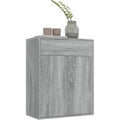 Das Sideboard misst 60 x 30 x 75 cm in Eichenbraun und Grau