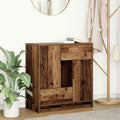 Das Sideboard nimmt mit 70.5 x 34 x 74.5 cm Gestalt an